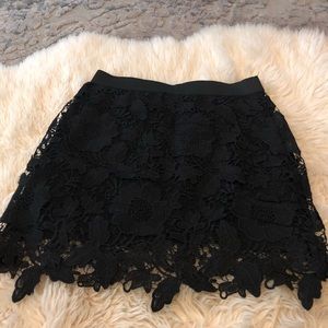 Black lace mini skirt